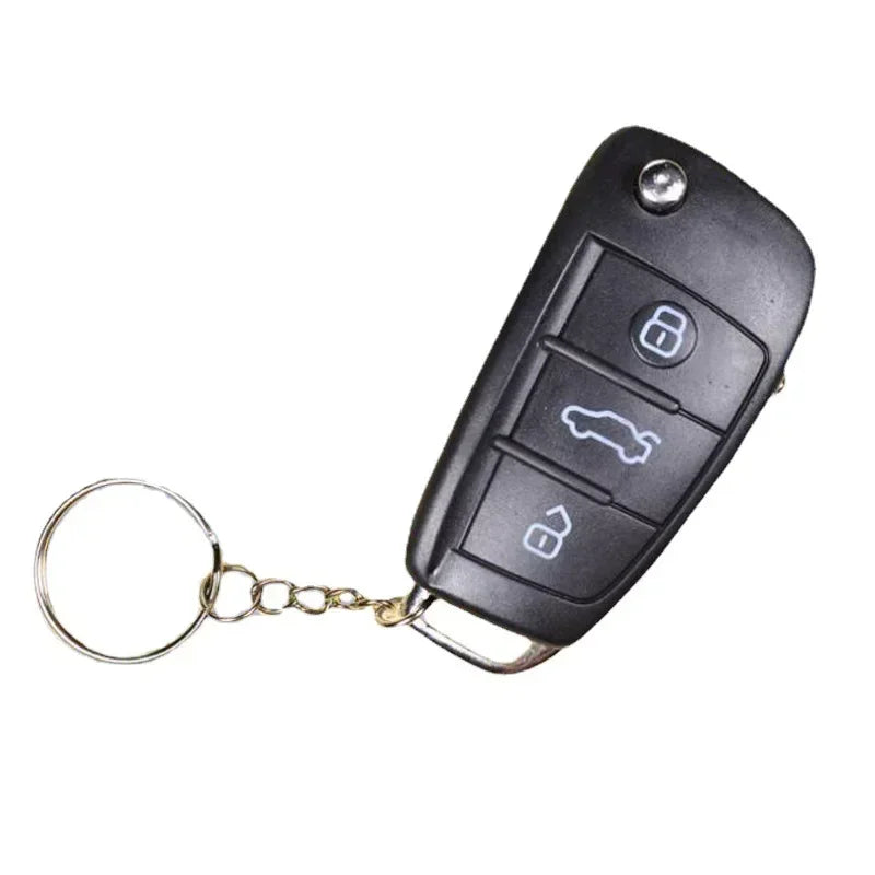 Black Electric Shock Car Key Prank Toy Keychain — Shock Gag Remote Key Ring (7 × 3.5 × 1.5 cm / 2.76 × 1.38 × 0.59 in)