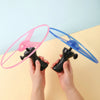 Luminous Pull-Line LED Flying Saucer Toy with Launcher — Light-Up Rotating Disk Flyer for Kids & Pets, Outdoor Fun