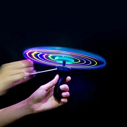 Glowing UFO Flying Saucer Toy with 5 LEDs — Pull-String Flying Disc for Kids & Outdoor Glow Parties