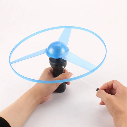 Flashing LED Spinning UFO Flying Saucer Toy with Pull String & Handle — 1-Pack Outdoor Kids Toy
