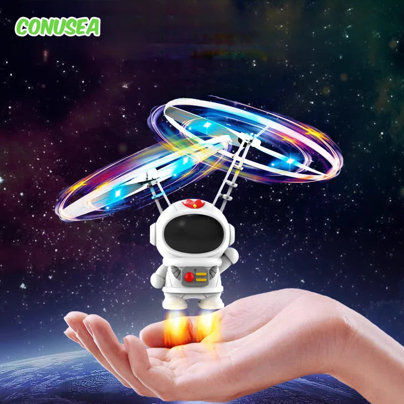 Hand-Controlled Flying UFO Drone Toy – Luminous Astronaut Mini RC Aircraft (17 x 10 x 12 cm / 6.69 x 3.94 x 4.72 in) USB Rechargeable Indoor & Outdoor Toy for Kids