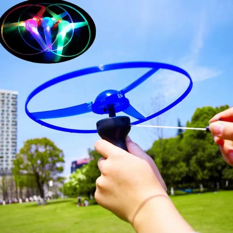 Luminous Pull-Line LED Flying Saucer Toy with Launcher — Light-Up Rotating Disk Flyer for Kids & Pets, Outdoor Fun