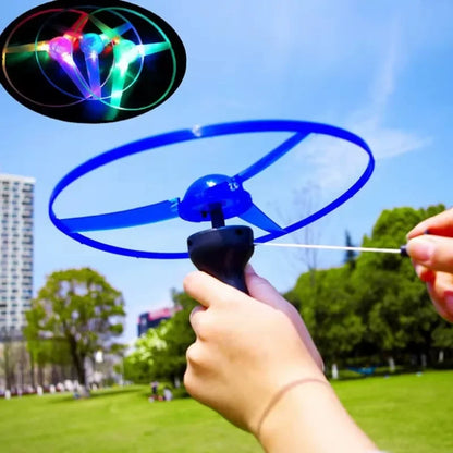 Luminous Pull-Line LED Flying Saucer Toy with Launcher — Light-Up Rotating Disk Flyer for Kids & Pets, Outdoor Fun