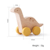 1PC Baby Beech Wood Dinosaur Car – Cartoon Educational Montessori Toy, Teething Play Gym, Baby Birthday Gift