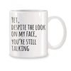 Funny Sarcasm Coffee Mug for Coworkers - Yet Despite The Look On My Face You're Still Talking Novelty White Ceramic 11 oz (325 ml)